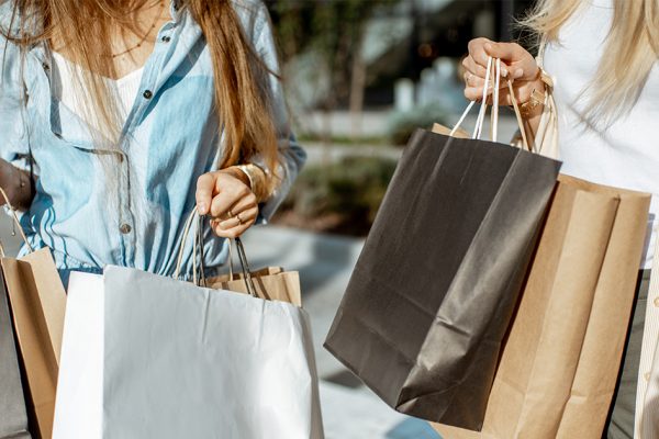 Two women holding shopping bags